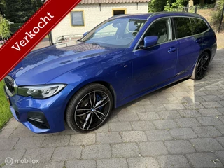 BMW 3-serie Touring 330e High Executive M-SPORT 2021