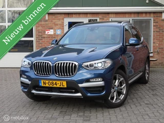 BMW X3 xDrive20i High Executive|Leder|Pano|Wegklapbare trekhaak|HUD|Camera|Zwarte Hemel.