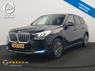 BMW iX1 xDrive30 67 kWh 313pk Dealer O.H. | Adaptief M Onderstel | Camera | Cruise Control | Stoelverwarming | Widescreen Navi | Park Assist | Apple Carplay | Navigatie | DAB | Standkachel |