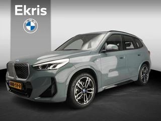 Hoofdafbeelding BMW iX1 BMW iX1 xDrive30 | M-Sportpakket | LED | Leder | Navigatie | Schuifdak | Stoelverwarming | DAB | Alu 19 inch