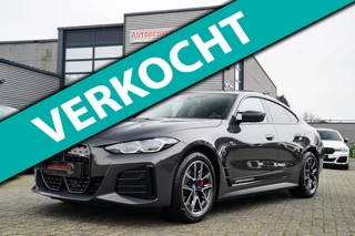 BMW I4 M50 High Executive 84 kWh | BTW | 360 Camera | LASER | Dravitgrau metallic | Adaptieve Cruise | Trekhaak | Schuif/kanteldak