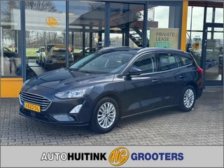 Hoofdafbeelding Ford Focus Ford Focus 1.0 EcoBoost Titanium - navi - sensoren- trekhaak