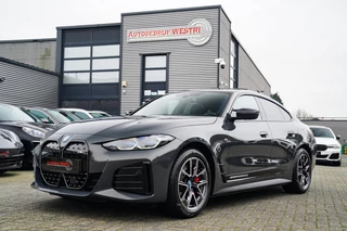 BMW I4 M50 High Executive 84 kWh | BTW | 360 Camera | LASER | Dravitgrau metallic | Adaptieve Cruise | Trekhaak | Schuif/kanteldak
