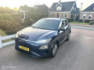 Hyundai Kona EV Fashion Design 64 kWh SOH 100% ACCU GARANTIE TOT EN MET 2028 CARPLAY CAMERA STOELVERWARMING ZEER COMPLETE AUTO!!