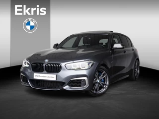 BMW 1 Serie M140i | High Executive | Akrapovič | Harman-Kardon | Stuurwielrand verwarmd | Achteruitrijcamera | Schuif-/kanteldak | Stoelverwarming