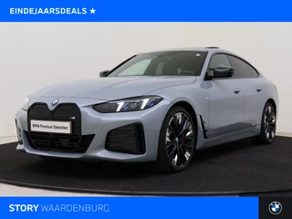 BMW i4 M50 / Schuif-kanteldak / Achteruitrijcamera / M Adaptief onderstel / Adaptieve LED / Stoelverwarming / Widescreen Display