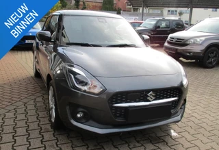 Hoofdafbeelding Suzuki Swift Suzuki Swift 1.2 AUTOMAAT ADAP CRUISE P-CAM STOELVERW.