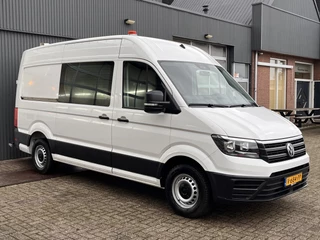 Hoofdafbeelding Volkswagen Crafter Volkswagen Crafter 35 2.0 TDI L3H3 Werkplaats inrichting Kast Inrichting Servicewagen Omvormer Standkachel Airco Cruise controle Camera Sortimo inrichting 1e eigenaar Dealer onderhouden Euro 6 Bpm vrij voor particulier gebruik