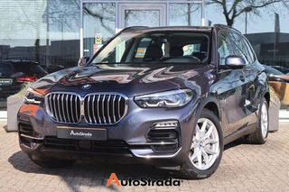 Hoofdafbeelding BMW X5 BMW X5 (g05) xDrive45e High Executive 394pk I Navi I Trekhaak I 360 cam I Harman/Kardon I HUD | ACC