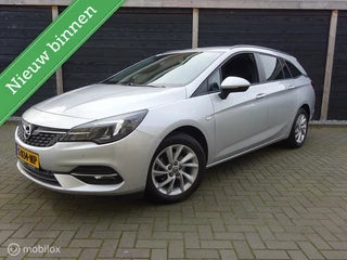 Hoofdafbeelding Opel Astra Opel Astra Sports Tourer 1.2 145PK!!! Edition FM nav / Stoel-stuur verwarming / 36.845 KM!!!