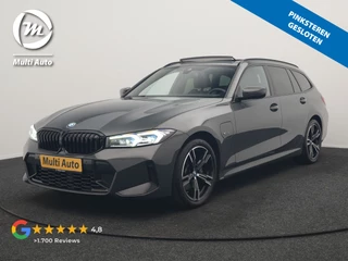 BMW 3 Serie Touring 330e M Sport FACELIFT PHEV 293pk Dealer O.H. | Dravitgray | Trekhaak Af Fabriek | Panodak | Head Up | Camera | Lederen Sportstoelen Verwarmd | Sfeerverlichting | Apple Carplay | Keyless | Blis | Cruise Control | Navigatie | DAB | Plug In Hybrid |