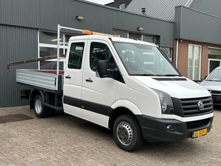 Hoofdafbeelding Volkswagen Crafter Volkswagen Crafter 50 2.0 TDI L2H1 DC Open laadbak Laadkraan Hiab 011 Trekhaak 3500kg Airco Cruise controle Pick-up open laadbak Euro 5 Dealer onderhouden 1e eigenaar Bakwagen Pick-up Autolaadkraan