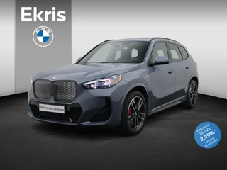 BMW iX1 eDrive20 M Sportpakket Pro | Premium Pack | Comfort Pack | Travel Pack | Stuurwiel Verwarmd | Panoramadak | Elektrisch Verstelbare Stoelen | Driving Assistant Plus | DAB | Harman Kardon | 19''