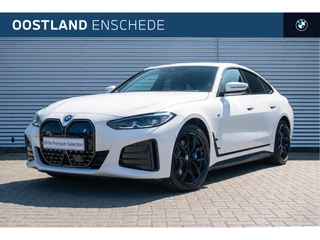 Hoofdafbeelding BMW i4 BMW i4 eDrive35 M Sport / Parking Assistant / Widescreen Display / Extra getint glas achter / Live Cockpit Plus / Cruise Control