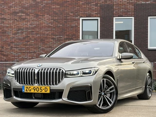 Hoofdafbeelding BMW 7 Serie BMW 7 Serie 745e High Executive 396pk | M Sportpakket | Cruise control adaptief met stop&go en stuurhulp | DAB | Harman/Kardon audio | Laser LED koplampen | Rondomzicht camera | Dealer onderhouden!
