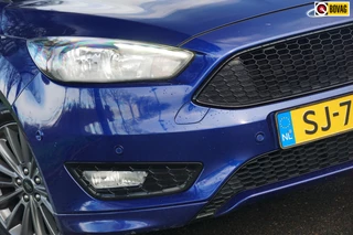 Hoofdafbeelding Ford Focus Ford Focus Wagon 1.0 Ecoboost 125pk ST-Line - Deep Impact Blue - Carplay/360 camera/Nav
