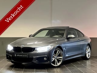 Hoofdafbeelding BMW 4 Serie BMW 4-serie Coupé 435i High Executive | Nap |  Schuifdak | H&K | M-Sport |