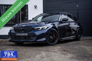 BMW 3-serie Touring 330e M Pano H&K Carbon INDIVIDUAL 20''