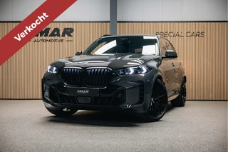 BMW X5 xDrive50e | Luxe stoelen | M-sport | Dravit Grau | Trekhaak | Stuur en stoelverwarming | Harman/Kardon |