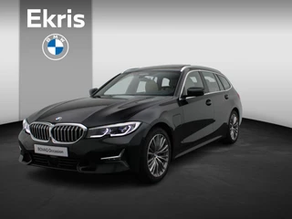 BMW 3 serie Touring 320e High Executive | Luxury Line | Audio Media Pack | Parking Pack | Safety Pack | BMW Personal CoPilot Pack | Stuurwielrand Verwarmd | Trekhaak | Panoramadak | Driving Assistant Professional | Head-Up Display | DAB | HiFi | 18''
