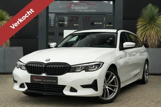 Hoofdafbeelding BMW 3 Serie BMW 3 Serie Touring 318i M Sportline Executive 157pk Navigatie/Stoelverwarming/PDC