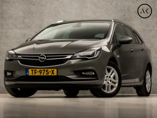 Opel Astra Sports Tourer 1.0 Sportline (APPLE CARPLAY, GROOT NAVI, GETINT GLAS, CHROOM PAKKET, XENON, SPORTSTOELEN, BLUETOOTH, CRUISE CONTROL, NIEUWSTAAT)