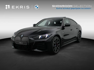 Hoofdafbeelding BMW i4 BMW i4 eDrive35 M Sport Edition | Comfort Pack | Stuurwielrand Verwarmd | Trekhaak | Schuifdak | Active Cruise Control | 19''