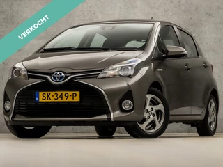 Toyota Yaris 1.5 Hybrid Sport Automaat (NAVIGATIE, CLIMATE, CAMERA, STOELVERWARMING, SPORTSTOELEN, BLUETOOTH, TREKHAAK, LM VELGEN, NIEUWE APK, NIEUWSTAAT)