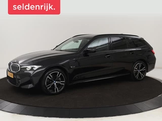 BMW 3-serie 330e M Sport | Leder | Trekhaak | Stoel & stuurverwarming | Carplay | Sportstoelen | Navigatie | Full LED | Park Assist | Live Cockpit | PHEV | Plug In