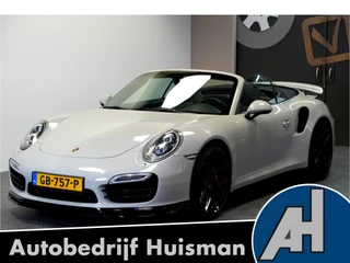 Hoofdafbeelding Porsche 911 Porsche 911 Cabrio 3.8 Turbo 441kW/600pk PDK7 NL-AUTO!! AKRAPOVIC COMPLEET + SPORT CHRONO + PDLS PLUS + KEYLESS DRIVE + PASM + CAMERA + STOELVERWARMING&-VENTILATIE + BOSE SOUND + TARGET BLUEYE + MOSHAMMER SPOILERPAKKET + PARKSENSOREN V&A + 20" VOSSEN LM-VELGEN!