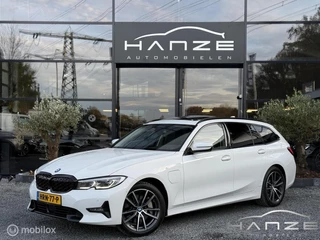 Hoofdafbeelding BMW 3 Serie BMW 3-serie Touring 330e High Executive|Pano|Laser|HUD