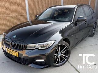 BMW 3-serie Touring 320e M sport Automaat | Zwart optiek | LED laserlichten | Leren bekleding | Stoelverwarming | DAB ontvanger | HiFi installatie | Navigatiesysteem | Cruise control adaptief | Climate control | Parkeersensoren voor en achter