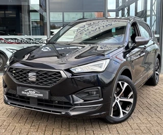 Hoofdafbeelding SEAT Tarraco SEAT Tarraco 1.4 TSI EHY. PHEV FR 245PK NAVI LEER PDC-CAMERA WINTERPACK.