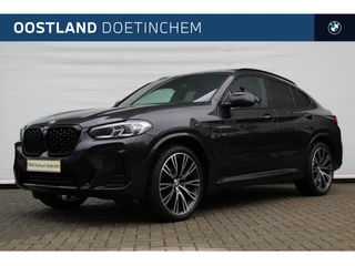Hoofdafbeelding BMW X4 BMW X4 xDrive20i M Sport Automaat / Panoramadak / Adaptieve LED / Sportstoelen / M Sportonderstel / Live Cockpit Professional