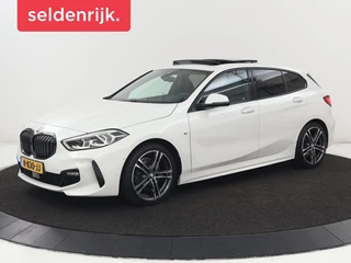 BMW 1-serie 118i High Executive Edition | M Sport |  Panoramadak | Leder | Stoelverwarming | Camera | Carplay | Live Cockpit | Sfeerverlichting | Trekhaak | Navigatie | Sportstoelen | Park Assist | DAB | Climate control