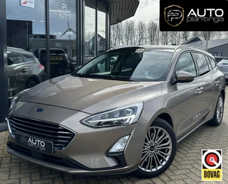 Ford Focus Wagon 1.0 EcoBoost Titanium Business 125PK | BOMVOL | ZEER NETTE STAAT | Elektrisch Glazen Panorama-dak | Achteruitrijcamera | Led Koplampen | Carplay | Keyless Entry | Parkeersensoren Voor en Achter | B&O Audio | Head Up | Stoel Stuur Voorruitverwarming | Elek Achterklep | Elek Bestuurderstoel | 2 Sleutels | Onderhoudshistorie |
