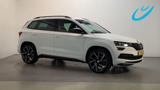Hoofdafbeelding Škoda Karoq Skoda Karoq 1.5 TSI 150pk DSG ACT Sportline Business Sfeerverlichting Camera Stoelverwarming Navigatie