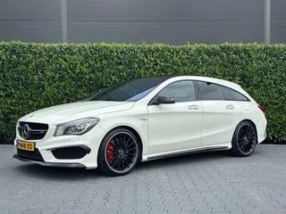 Mercedes CLA-klasse Shooting Brake AMG 45 4MATIC PANO, NAV, CRUISE, ECC, SCHAALSTOELEN, CARBON, H/K, STOELVERWARMING, 19''