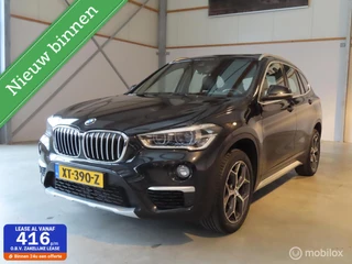 Hoofdafbeelding BMW X1 BMW X1 sDrive20i Orange Edition III|Panoramadak|Leder|Camera|el achterklep|Stoelverwarming.