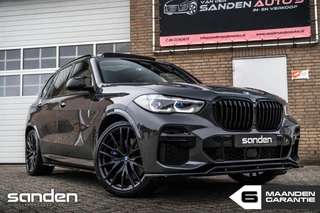 Hoofdafbeelding BMW X5 BMW X5 xDrive45e Msport|Dravit grau|SkyLounge|360|Luchtv|HUD
