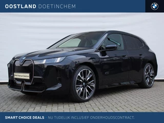 BMW iX xDrive60 / Panoramadak Sky Lounge / Trekhaak / Bowers & Wilkins / M Multifunctionele Stoelen / Parking Assistant Professional / Soft-Close