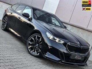 Hoofdafbeelding BMW 5 Serie BMW 5-serie Touring 520i M-sport 21Inch M5 Performance H&K Carbon Pano