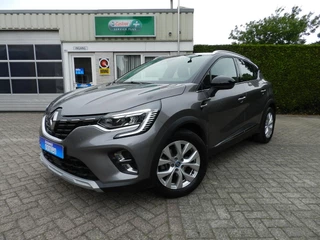 Hoofdafbeelding Renault Captur Renault Captur 1.6 E-Tech Plug-in Hybrid 160 Serie Limitée E-TECH 143PK !! - Trekhaak + Apple Carplay Android Auto - ParkHulp Voor & Achter - 100% Onderhouden - Stoelverwarming & Stuurwielverwarming