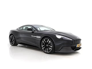 Hoofdafbeelding Aston Martin V12 Vanquish Aston Martin V12 Vanquish 6.0 Touchtronic 2+2 *CERAMIC-BRAKES | B&O-SURROUND | CARBON | VOLLEDER | XENON | MEMORY-PACK | NAVI-FULLMAP | CAMERA | DAB | ECC | PDC | CRUISE*