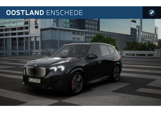 Hoofdafbeelding BMW iX1 BMW iX1 eDrive20 M Sport / Panoramadak / Trekhaak / Achteruitrijcamera / Comfort Access / Sportstoelen / Adaptieve LED / M Adaptief onderstel / Parking Assistant / Stoelverwarming