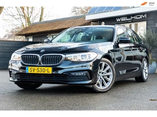 BMW 5-serie Touring 520i Sportline Trekhaak I Stuur & stoelverwarming I Trekhaak I Sfeerverlichting I Leder I Camera I Led