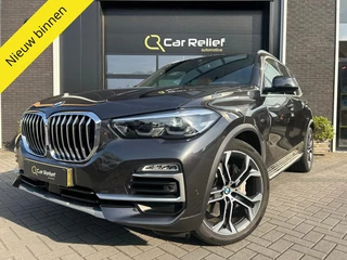 Hoofdafbeelding BMW X5 BMW X5 xDrive45e High Executive | Luchtvering | Pano | Memory Seats | HuD | ACC | Trekhaak |