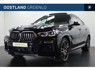 Hoofdafbeelding BMW X6 BMW X6 M50i High Executive Automaat / Panoramadak Sky Lounge / Laserlight / Massagefunctie / Soft-Close / Parking Assistant Plus / Adaptief M Onderstel