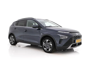 Hoofdafbeelding Hyundai Bayon Hyundai Bayon 1.0 T-GDI Premium Sky MHEV (INCL-BTW) *PANO | ADAPTIVE-CRUISE | FULL-LED | BOSE-SOUND | BLINDSPOT | DIGI-COCKPIT | HEATED-SPORTSEATS | CAMERA | DAB | KEYLESS | PRIVACYGLASS | TOWBAR | 16''ALU*