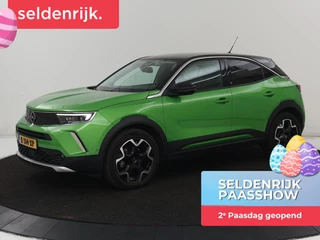 Opel Mokka-e Ultimate 50 kWh | SOH 90% | 3 Fase |  Stoelverwarming | Leder/Alcantara | Warmtepomp | Adaptive cruise | Camera | Stuurverwarming | Carplay | Matrix LED | Navigatie | Park Assist